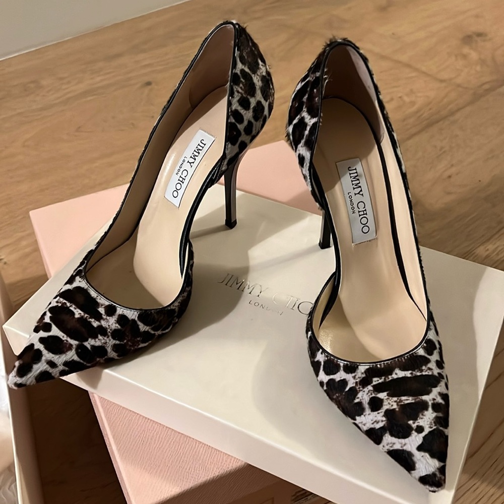 Jimmy Choo Size 9 1/2 pony hair animal print with metallic heel.